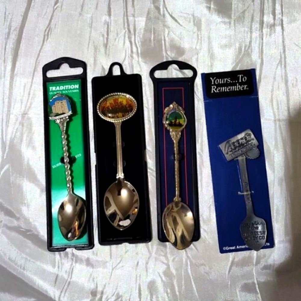 Bundle of collectible silver baby spoons with cases